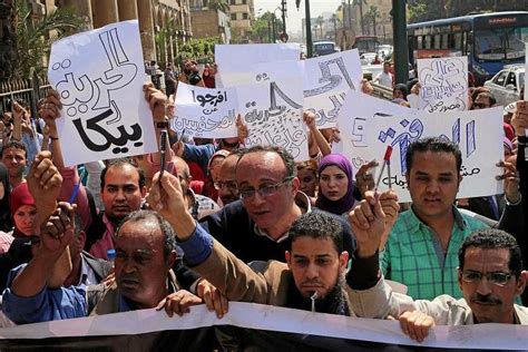 Egyptian Police Raid Press Syndicate Arrest Two Journalists Critical Of Govt The Straits Times