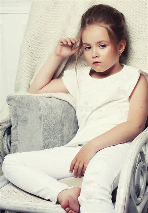 Girl Fashion Portrait Child Model Sitting In Chair Stock Photo Image