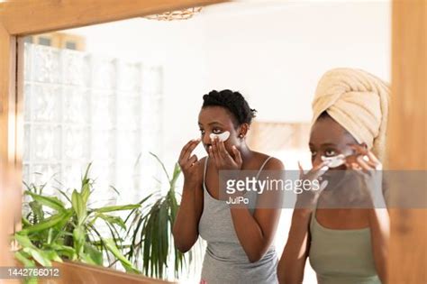 Two Young African Women Using Eye Patch High Res Stock Photo Getty Images