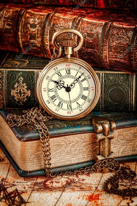 Old Books And Vintage Pocket Watch Stock Photo By ©cookelma 110216538