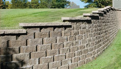 This project used about 165 blocks, 30 bags of gravel, and my finished wall was 39 feet long. Guideline - How To Build A Keystone Block Retaining Wall ...