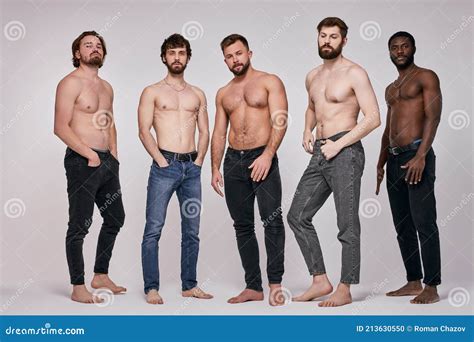 Portrait Of Shirtless Diverse Men Posing Seriously At Camera Guys In Jeans Stock Photo Image