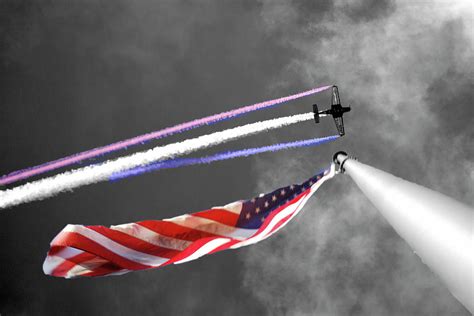 Plane Over Flag Photograph By Michael Riley Pixels