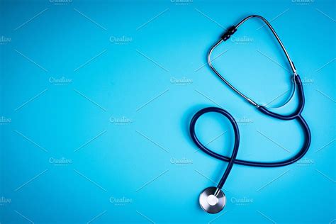 Stethoscope On Blue Background Stock Photo Containing Doctor And