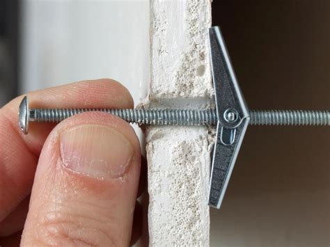 How To Install Drywall Anchors Molly Bolts And Toggle Bolts Hgtv