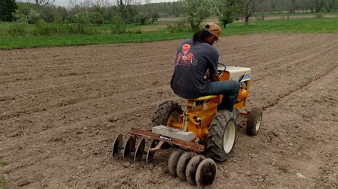 Ih Cub Cadet 71 With Brinly Disc Covering Potatoes Youtube