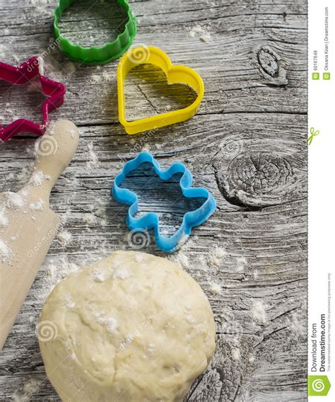 Dough Cookie Cutters Rolling Pin On A Light Wooden