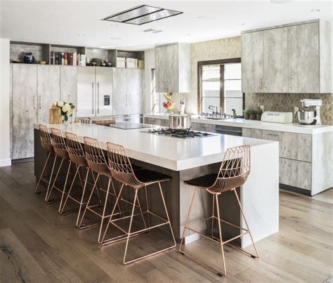Playing with the elements of a neutral palette, incorporating natural materials, and carving out a weathered feel gives them a sense of creativity and refreshment. Inside the Rustic Meets Modern Kitchen of a Renowned Chef - Airows