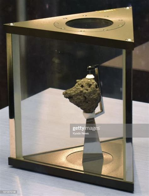 A Rock From The 1969 Apollo 12 Moon Landing Is Exhibited At The News