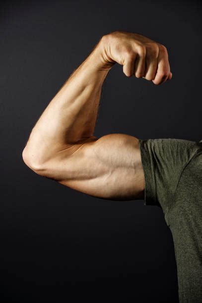 Best Man Flexing Arm Stock Photos Pictures And Royalty Free Images Istock