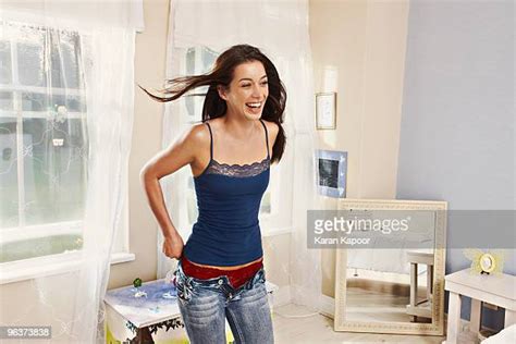 Woman Getting Dressed Fun Photos Et Images De Collection Getty Images