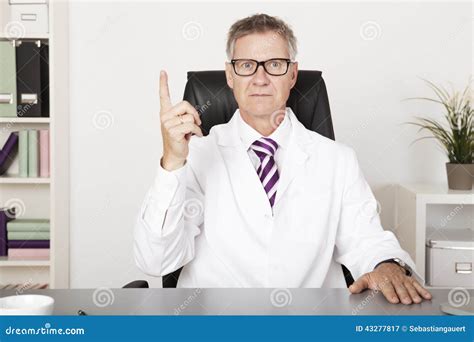 Male Physician Showing First Hand Sign Stock Image Image Of Finger Raised