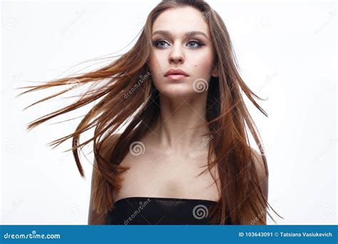 A Young Girl With A Gentle Classical Makeup And Loose Hair Beautiful Model With Nude Makeup And