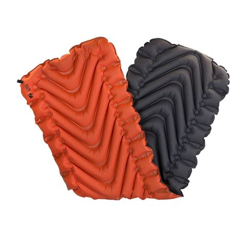 Rolled up, klymit insulated static v sleeping pad measures 5 x 9 in. KLYMIT INSULATED STATIC V SLEEPING PAD