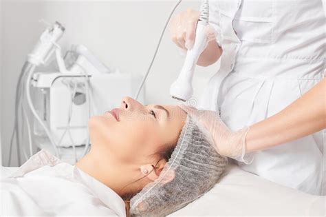 Cosmetologist Makes Rf Lifting For Rejuvenation Woman Face Anti Aging