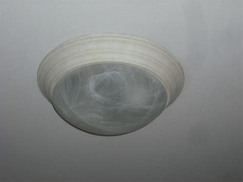 Changing a light bulb is one of the easiest home projects to complete. Changing a bulb in a flush mount fixture - DoItYourself ...