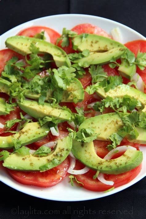 Quick Salad Idea Sliced Tomatoes Sliced Avocados A Few Onions