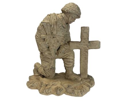 Soldier Kneeling At Cross Statue