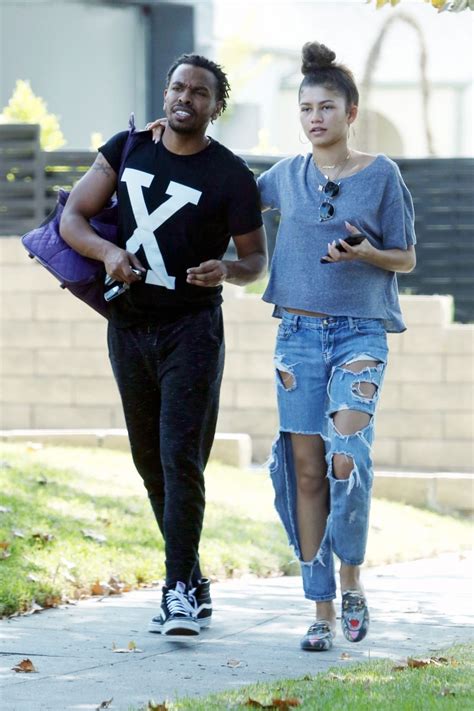 Our starlet still lives at home with her parents and not because she she titled this picture: ZENDAYA COLEMAN Out with Her Brother Austin in Los Angeles ...