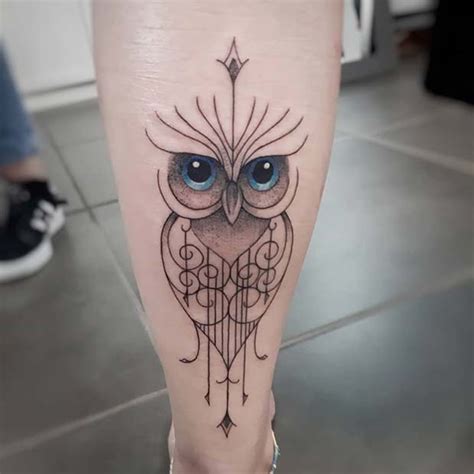Owl Tattoo With Green Eyes This Shoulder Owl Tattoo Has Got Flowers
