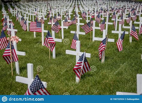 Military Grave Marker Crosses Decorated With American Flags Editorial