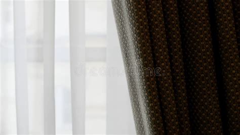 Voile Curtain In Front Of Window With Textured Pleated Fabric To Side
