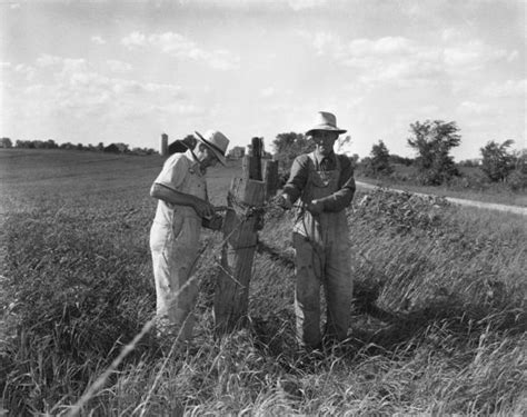 Two Farmers Stringing Barbed Wire Photograph Wisconsin Historical Society