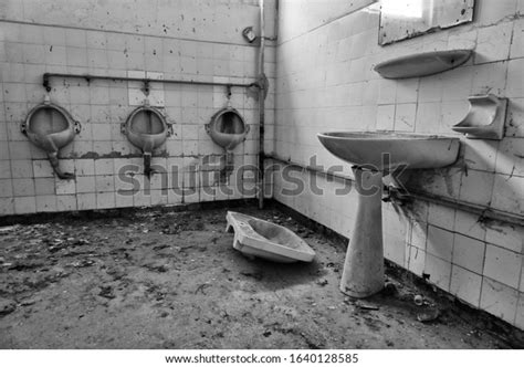 Dirty Bathroom Inside Abandoned Building Interior Stock Photo
