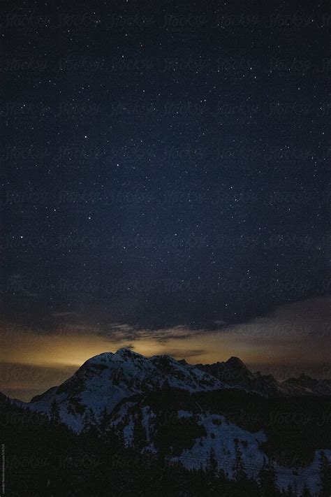 Austrian Mountain Peak Under Starry Night Del Colaborador De Stocksy