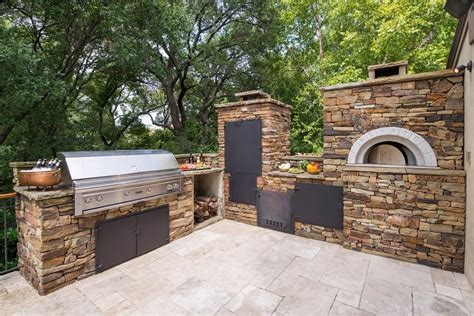 Outdoor kitchens are usually focused around a grill, pizza oven or hearth. Outdoor Kitchen with smoker and pizza oven :: Fort Worth ...