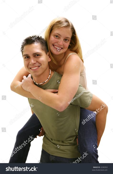 Young Man Carrying His Girlfriend On Stock Photo 2230353 Shutterstock