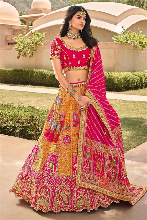 Buy Yellow And Pink Zari Embroidered Banarasi Silk Lehenga Online