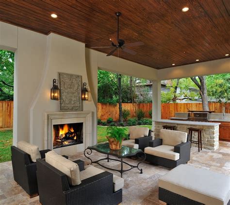 This piece of wall art is delicate and ornate. Outdoor Living Room & Kitchen with fireplace. It's like a ...