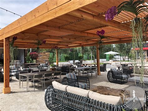 Can a pergola be used as a porch? Modern Louvered Garden Pergolas, Custom Made from Redwood