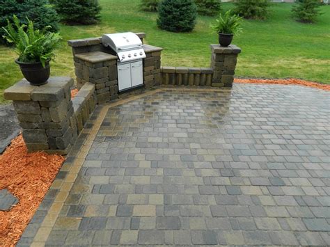 You will only need some bricks, furniture, and some large stones for decoration. Paver Patio Design Rosemount, MN | Devine Design Hardscapes