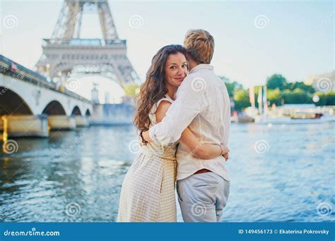 Happy Romantic Couple In Paris Near The Eiffel Tower Stock Image