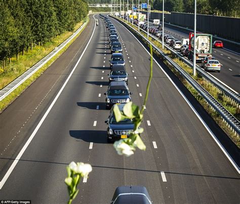 Bodies Of Mh17 Victims Arrive Back In The Netherlands Daily Mail Online