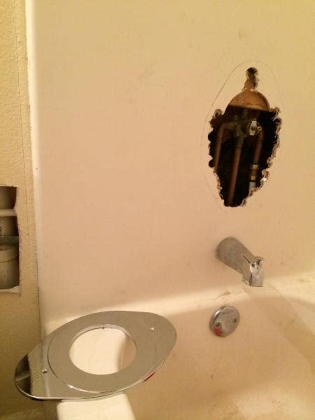 If you have the single handle style shower or tub, you might want. Fix whole in bathtub near faucet - DoItYourself.com ...