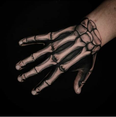 Best Skeleton Hand Tattoo Designs