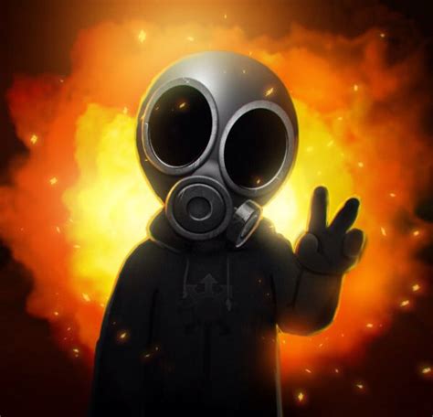 A Person Wearing A Gas Mask Standing In Front Of A Blazing Explosion