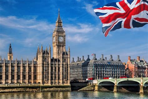 Big Ben With Flag Of United Kingdom In London Uk The Hottinger Group