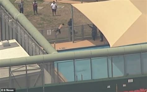 riot squad called in as three inmates climb on the top of sydney detention centre daily mail