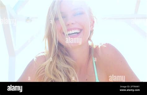 Beautiful Blonde Bikini Girl On Vacation With Lens Flare Steadicam Shot Stock Video Footage