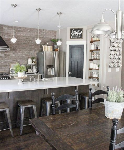 A traditional touch to the classic white and gray brings the fun, and joyful elements of a farmhouse look to a more sophisticated, yet inviting kitchen interior. We give this kitchen a 10 out of 10! This beautiful modern ...