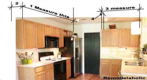 But, the black cabinets aren't really working at all. Update Builder Grade Cabinets Fast Without Painting