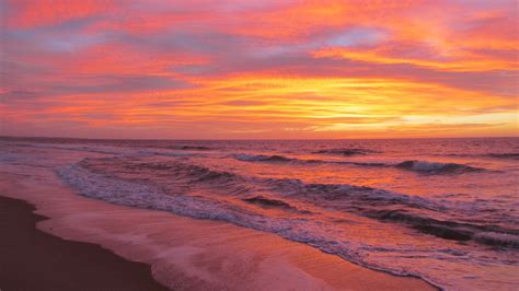 Beautiful Sunset With Colourful Clouds Under Seashore 4k Hd Nature