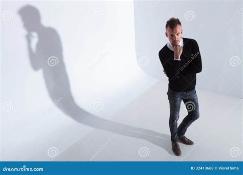 Casual Man Looks Up At You Pensively Stock Photo Image Of Male