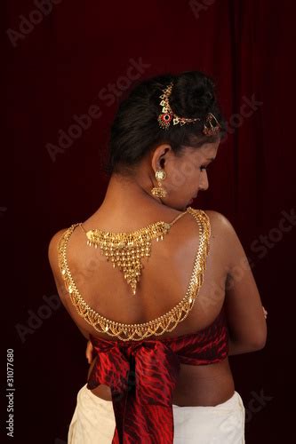 Girl With Gold Ornaments On Nude Back Stock Photo And Royalty Free