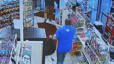 Clerks Fight With Armed Shoplifter Caught On Camera
