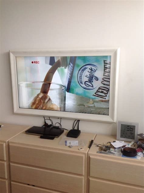Learn how to make a mirror tv in our complete guide. White Driftwood Frame | Mirror tv, Framed tv, Television wall